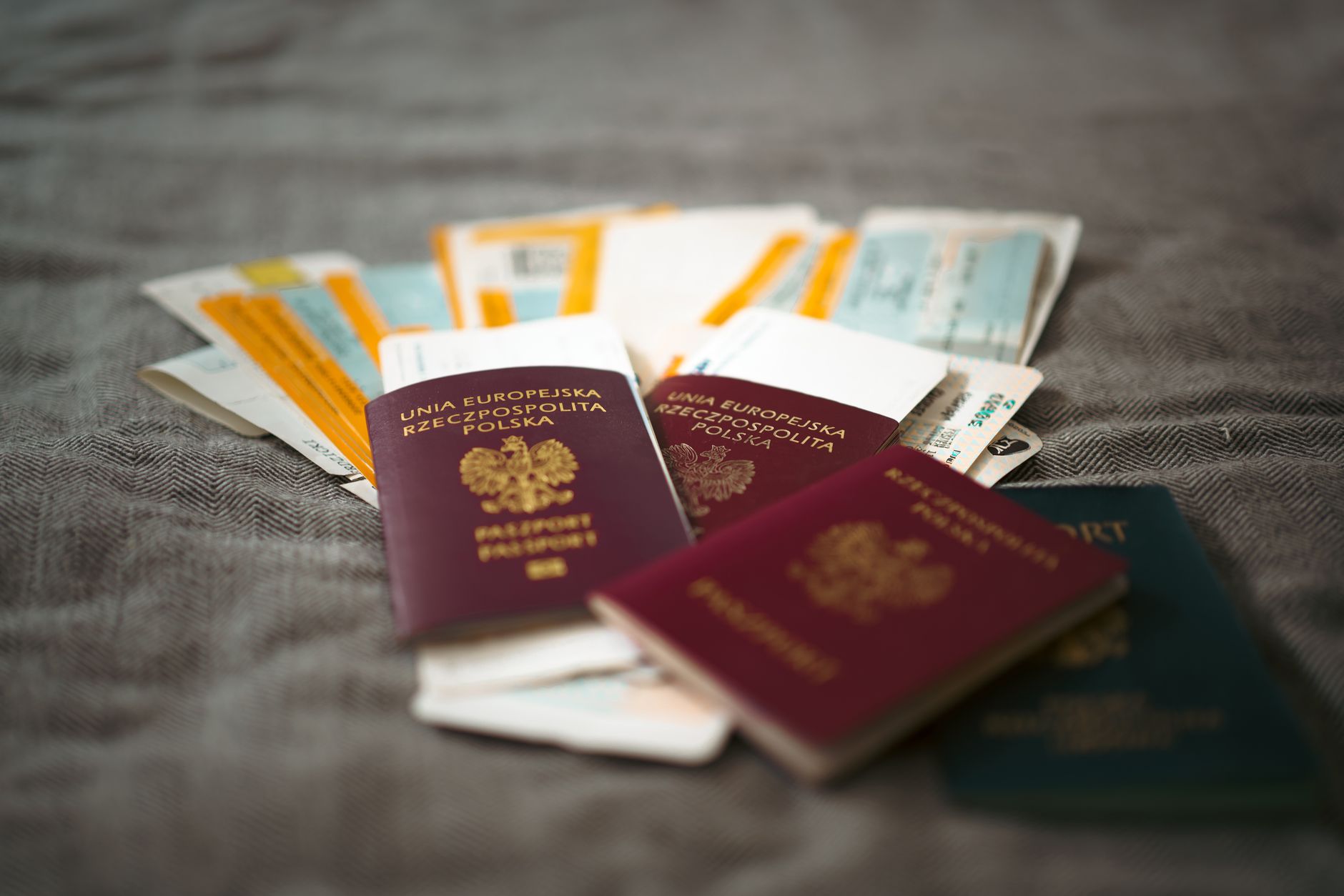 polish passports and travel documents on a table
