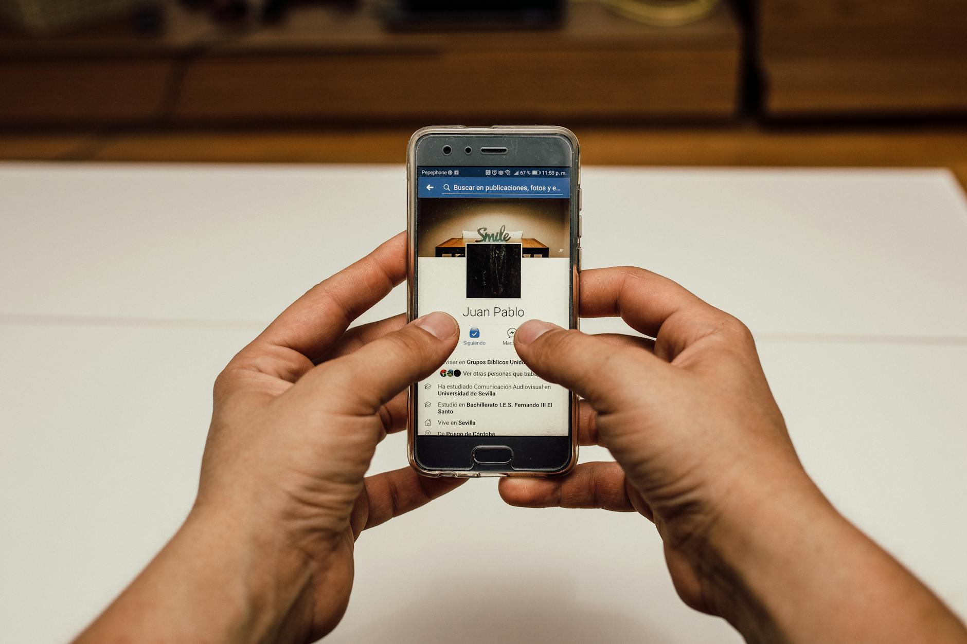 person holding silver smartphone