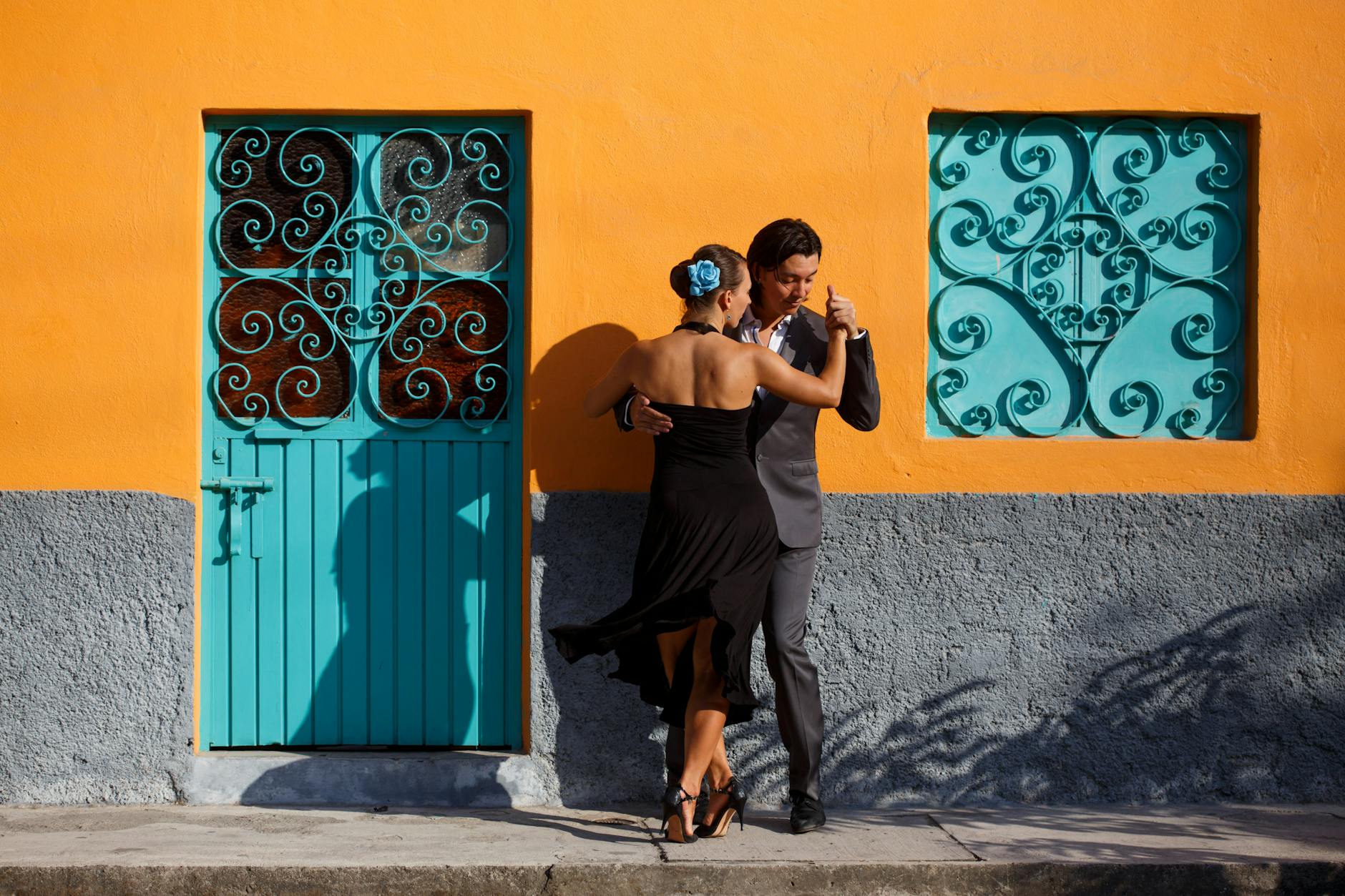 man and woman dancing tango