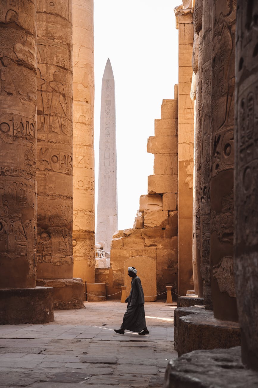 person walking near columns