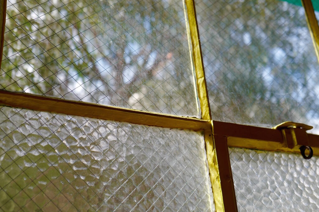 artist studio painter yellow trim window safety glass