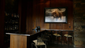 Aman Resort, Amangani, Jackson Hole, Wyoming, USA, travel destination, luxury, resort, interior bar buffalo photograph, bar, lounge, hotel