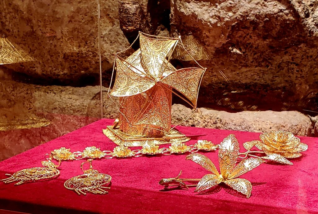 Intricate Portuguese gold filigree decorative piece at The House of Filigree in Porto
