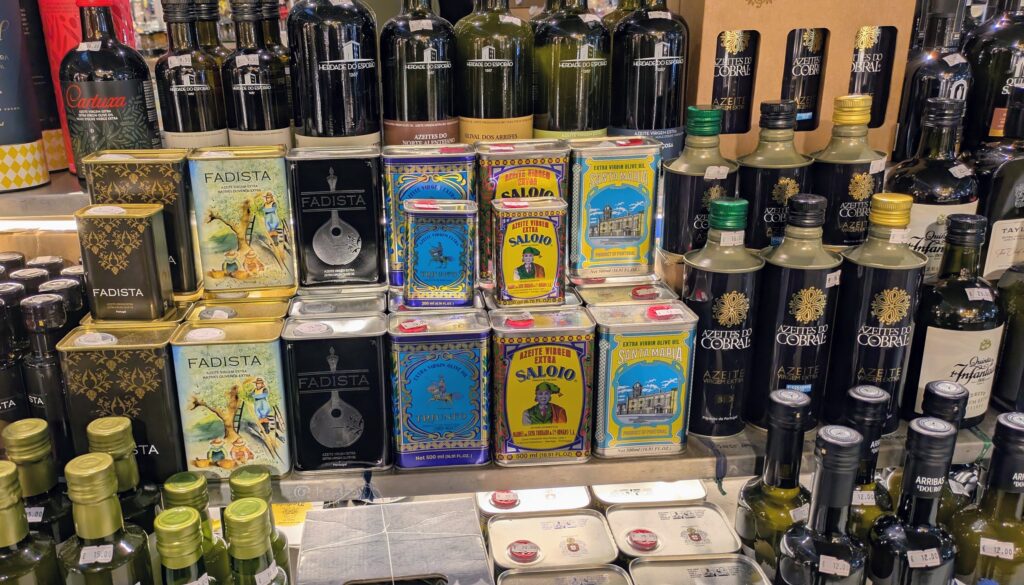 Selection of locally produced olive oils displayed at a Portuguese market