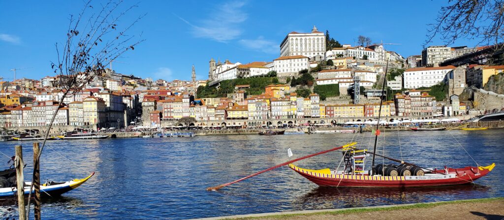 Rabelo boats on the Douro River with Porto’s Ribeira riverfront in the background