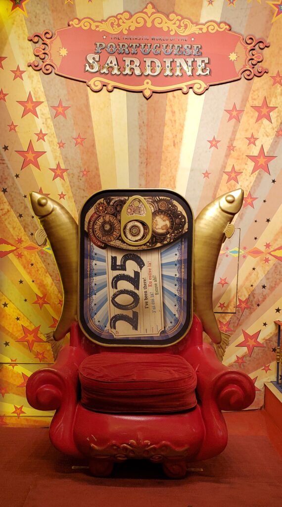 Colorful and quirky sardine-themed chair display at the Fantastic World of the Portuguese Sardine shop
